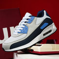 Breathable sports and leisure shoes for men women in white blue moon colour with lace-up closure, EVA upper and rubber sole