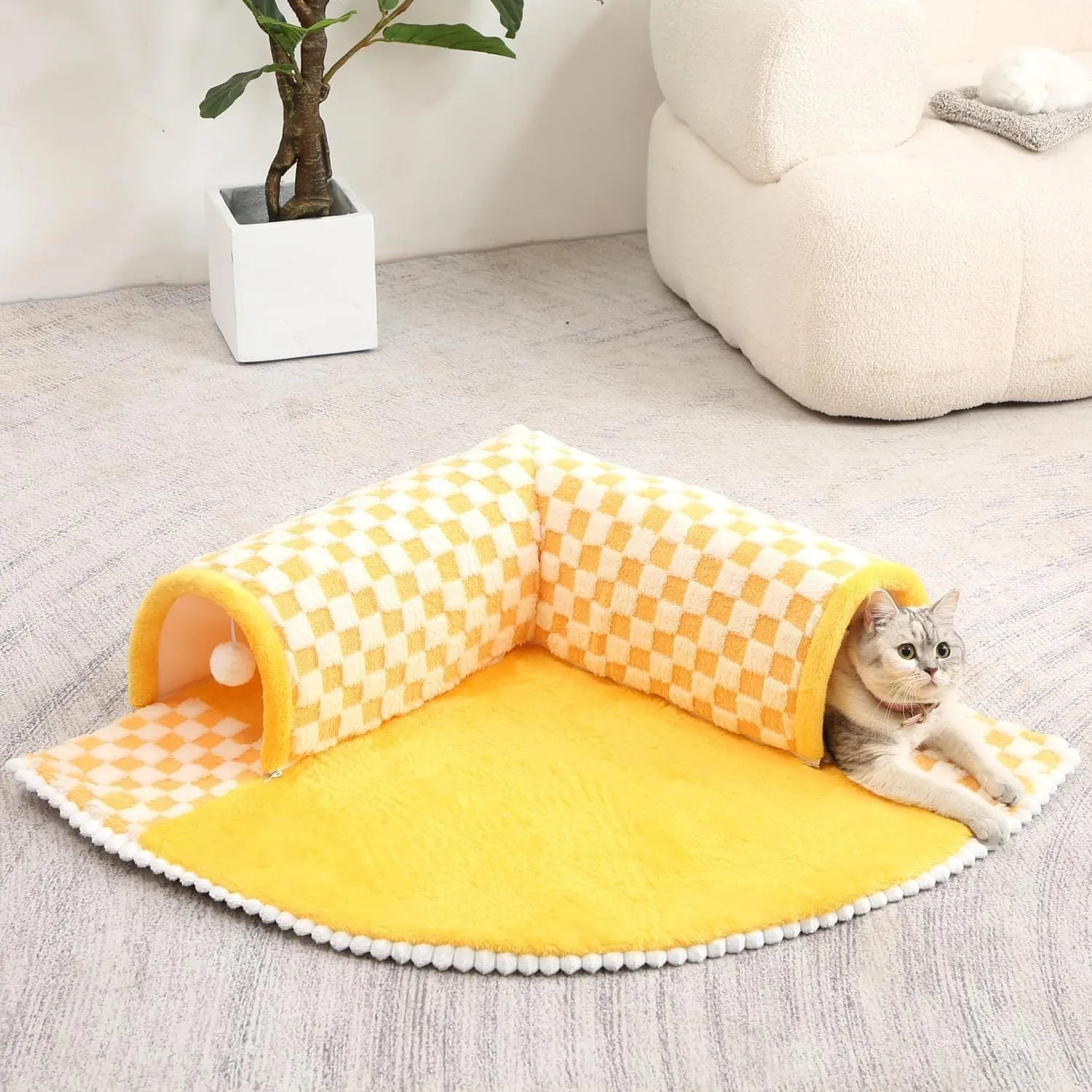 Soft plush fan-shaped 2-in-1 pet bed and tunnel for dogs and cats in plaid design.
