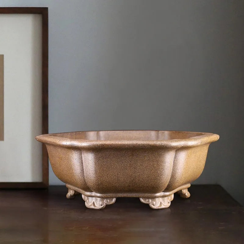 Handmade purple sand tea basin crafted from Pinus taiwanensis firewood clay in hexagonal or begonia styles