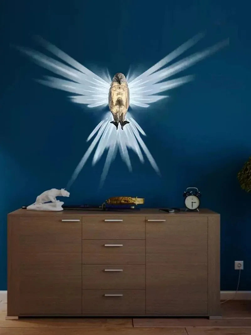 Eagle-shaped 3D projector wall lamp with resin plastic construction showing light projection effects