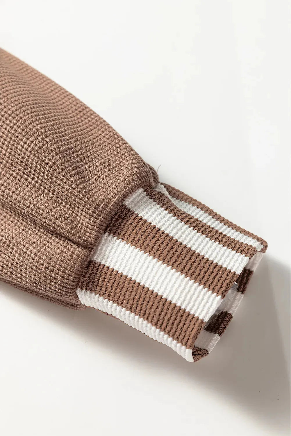 Straw yellow waffle texture hoodie with striped patchwork and button neck closure