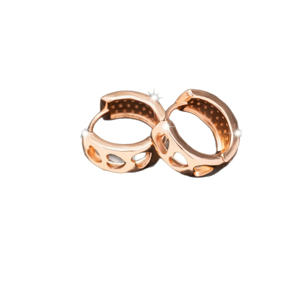Rose gold hollowed-out stainless steel earrings showing three heart shapes in a circular design.