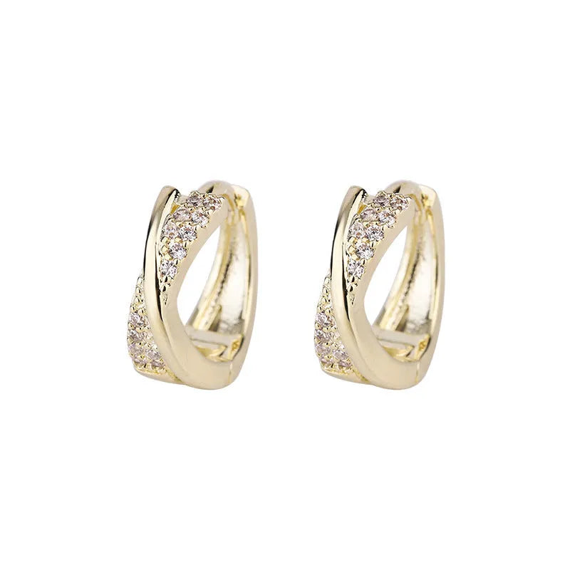 Geometric shape earrings with zircon detail and 14K yellow gold finish on copper