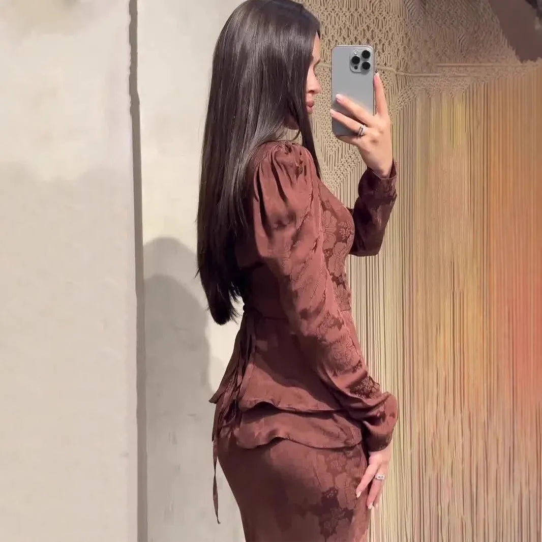 Dark brown women's retro dress with fake two-piece design, button details, and long sleeves.