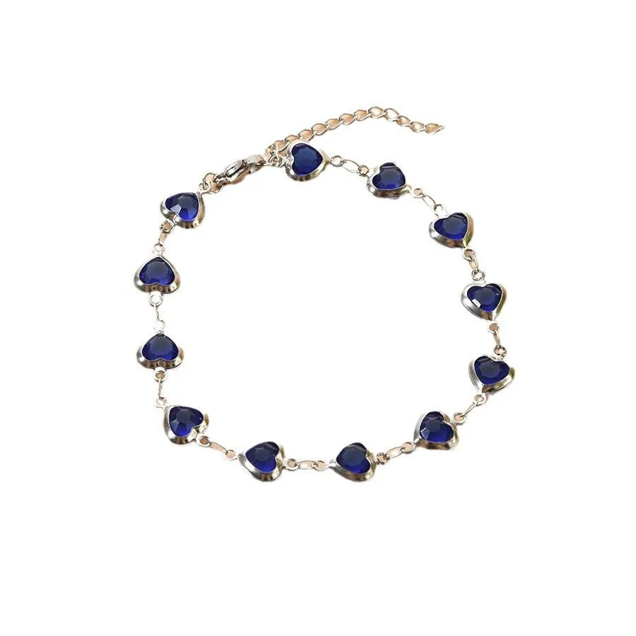 Geometry heart bracelet with devil's eye design in stainless steel showing six colour options