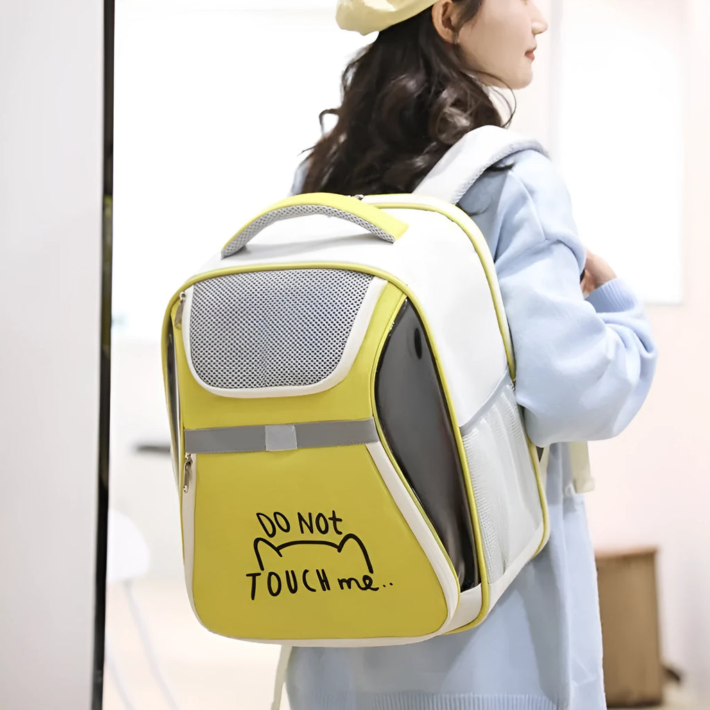 Expandable pet backpack in beige with contrast-pattern PVC Oxford material, medium capacity, on display