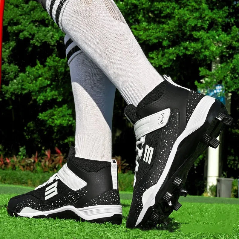 Black and white sports sneakers with a mesh upper, Velcro strap, and wear-resistant rubber sole.