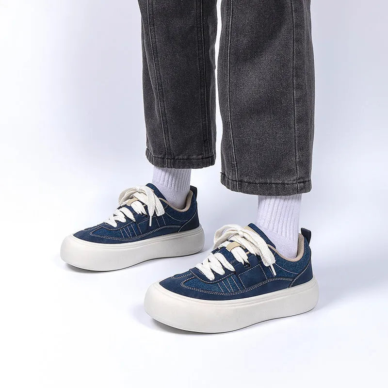 Men's black casual canvas shoes with platform sole and lace-up front.