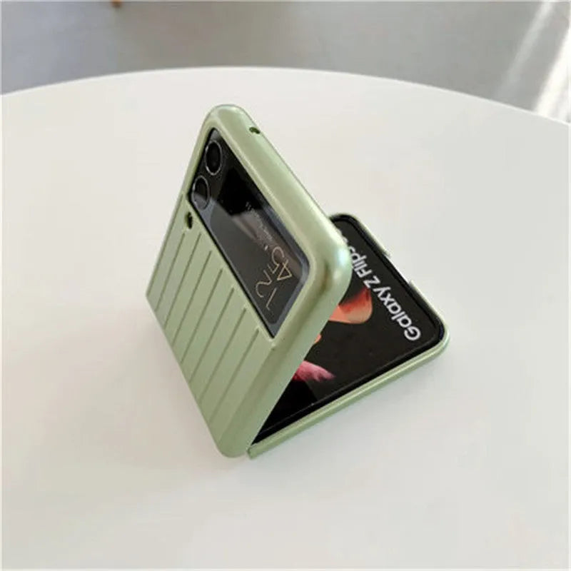 Ultra-thin flip phone case for Samsung Z Flip3 in seven solid colours on a table.