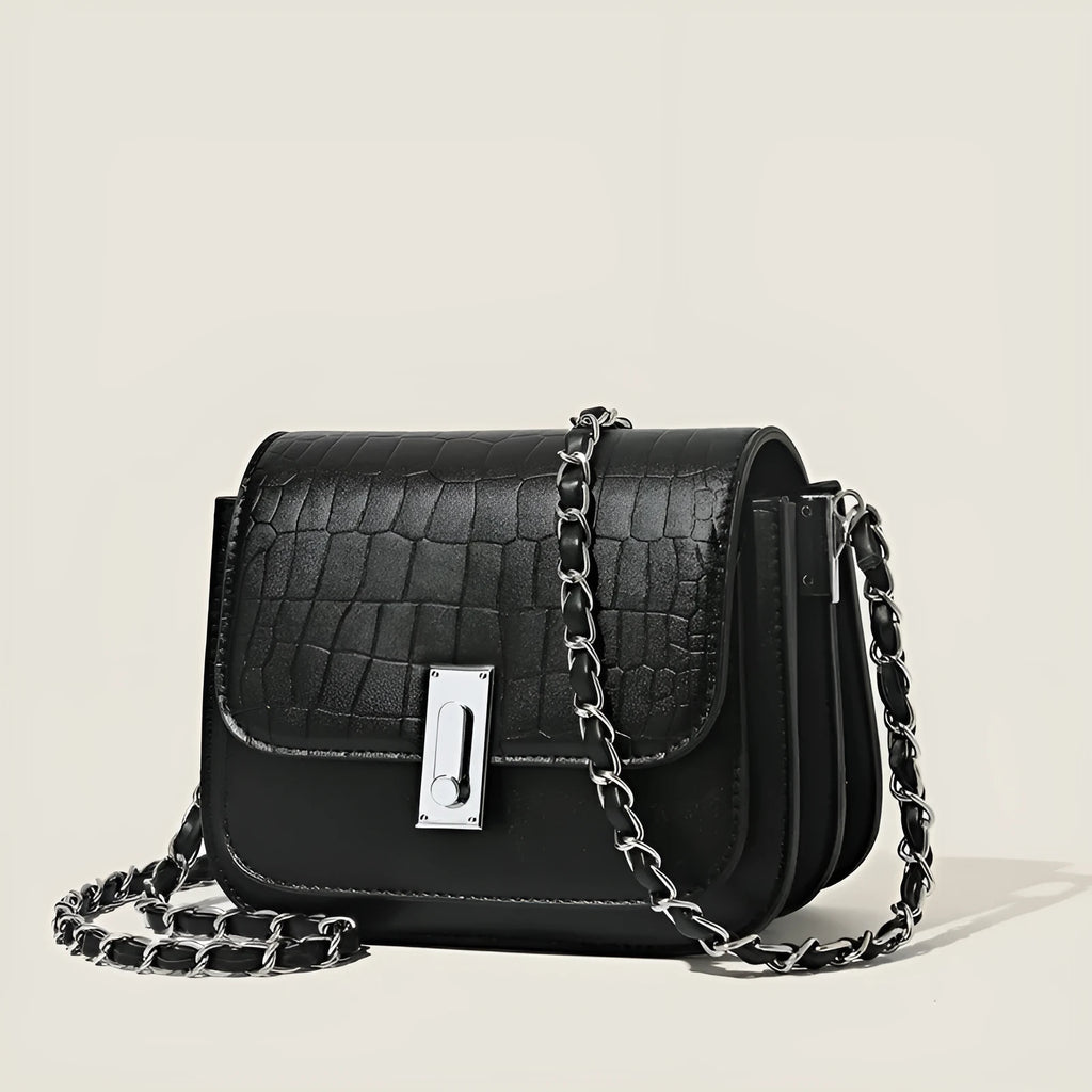 Women's soft PU chain crossbody shoulder bag in black, showing internal phone pocket and outer compartments.