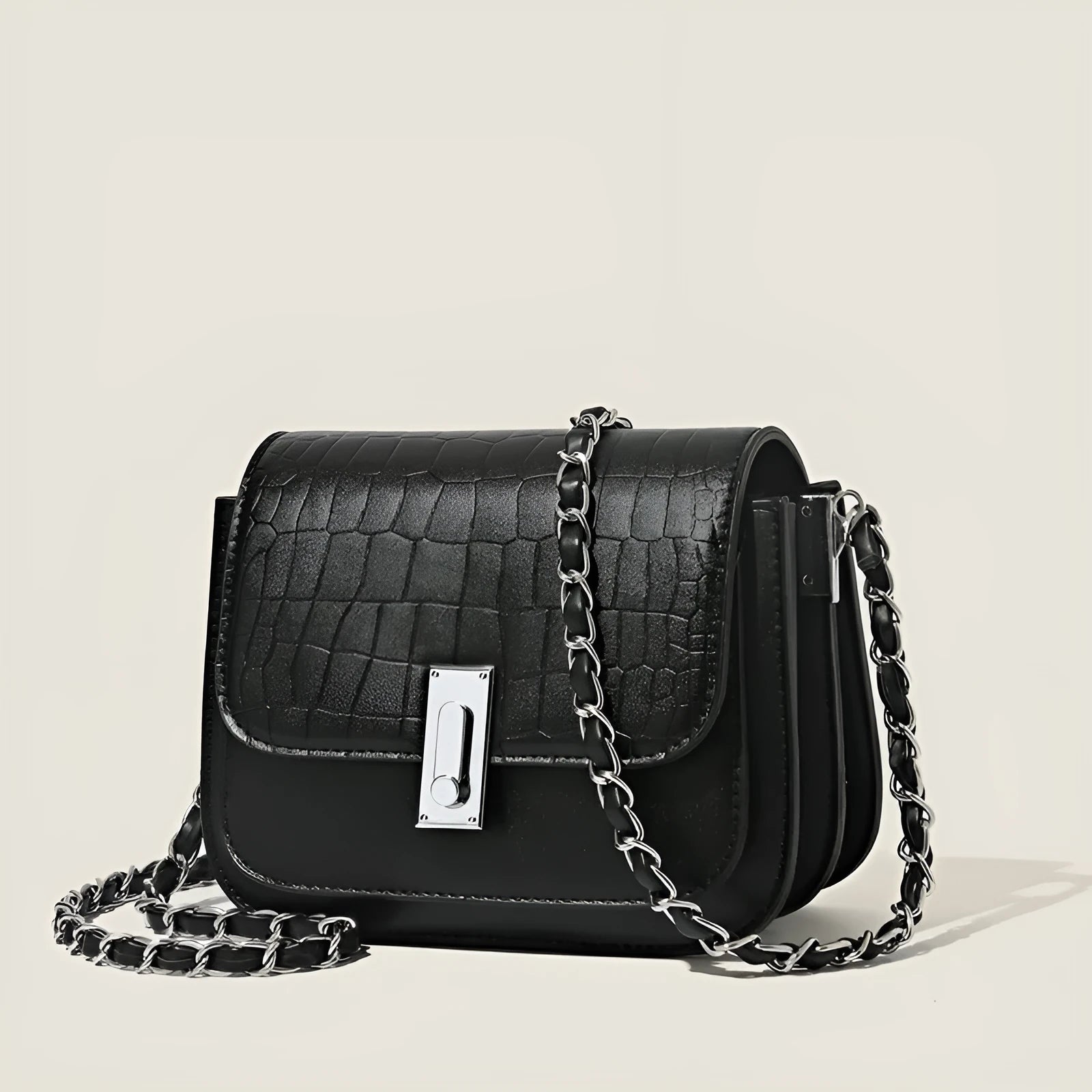 Women's soft PU chain crossbody shoulder bag in black, showing internal phone pocket and outer compartments.