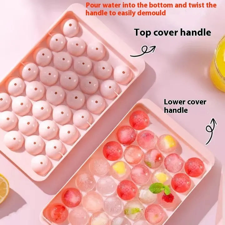 Blue silicone ice cube tray with lid showing 33 round holes for large ice cubes