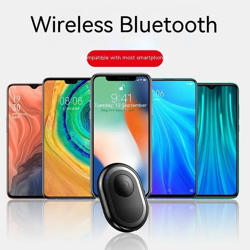 Compact black wireless Bluetooth remote control for smartphone camera photography