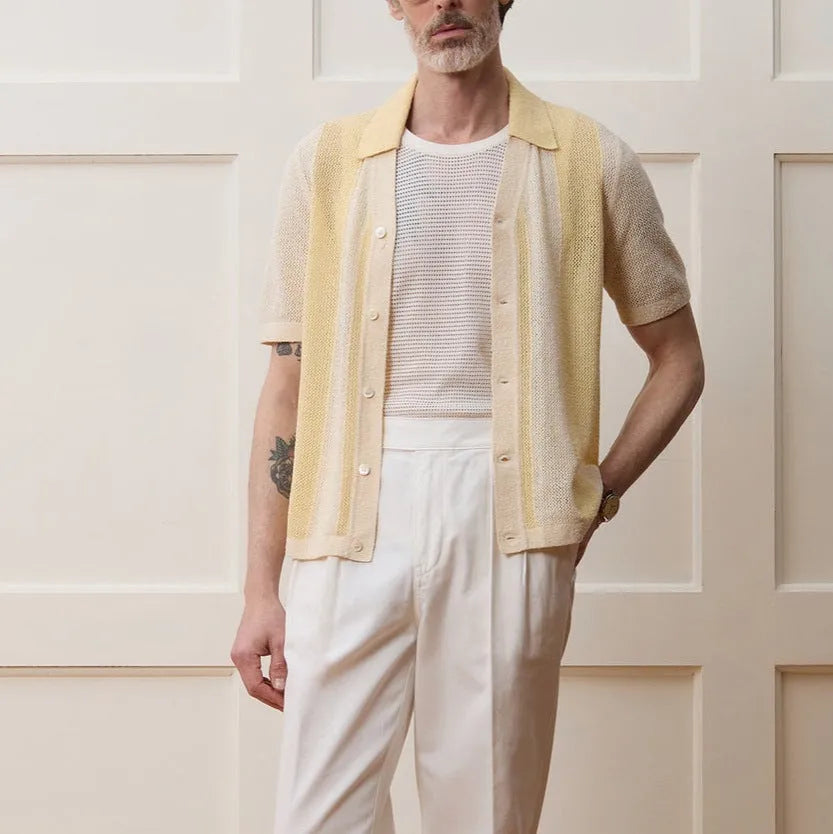 Yellow casual polo shirt with hollow-out asymmetric design and short sleeves in Tencel fabric