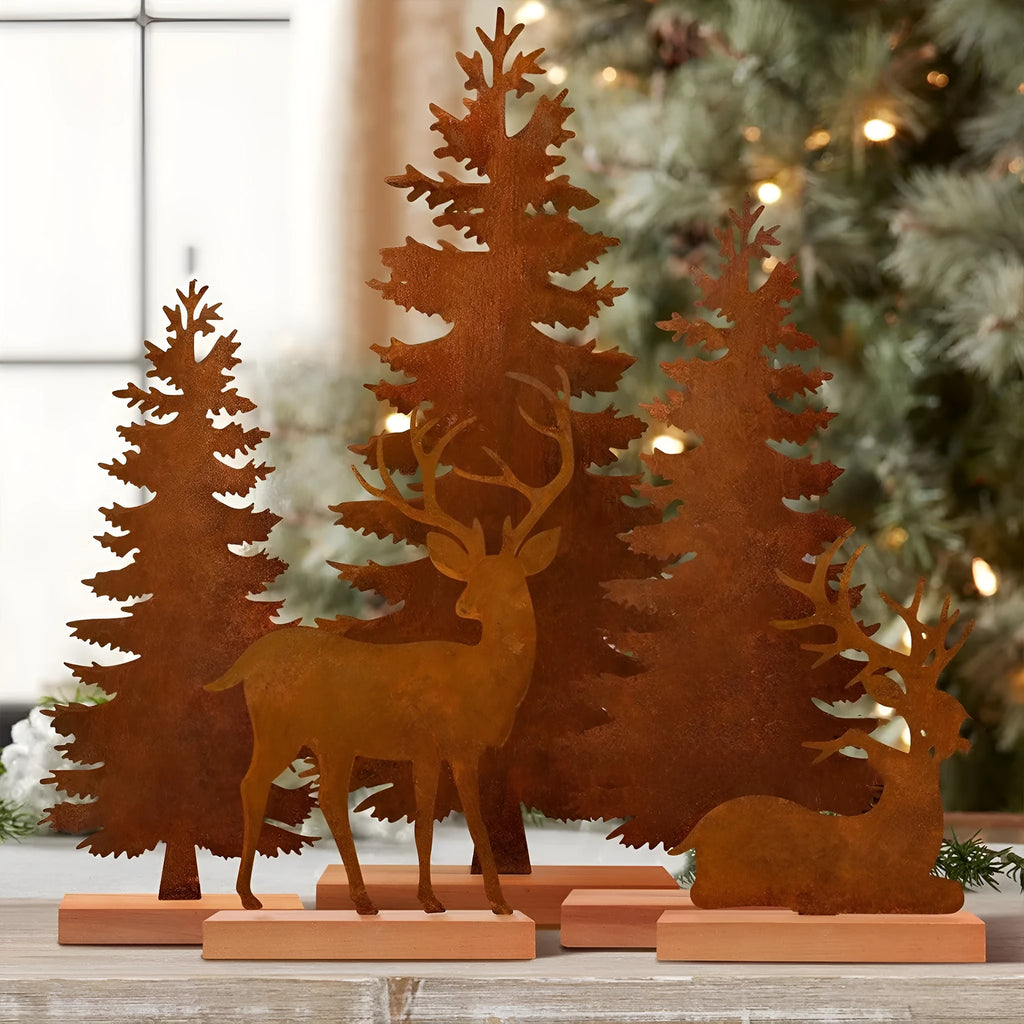 Three rustic iron metal Christmas tree decorations with elk silhouettes and weathered finish