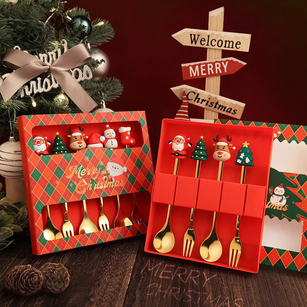 Red stainless steel Christmas spoons and forks with snowman, tree, and Santa handle designs.