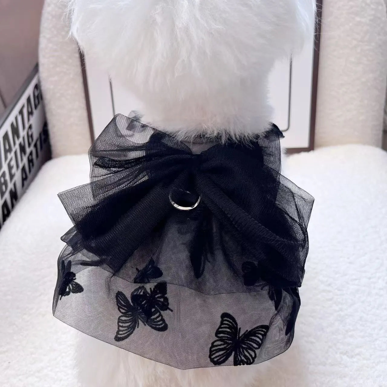 Black polyester princess tulle skirt for a small dog or cat on a white background.