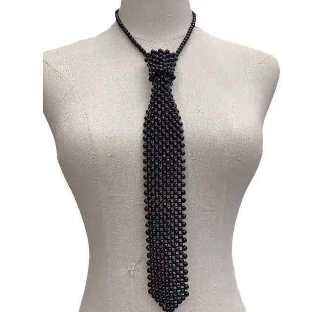 Adjustable pearl body chain with hollow-out design and alloy tie clasp in white or black colour