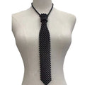 Adjustable pearl body chain with hollow-out design and alloy tie clasp in white or black colour