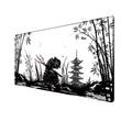Japanese samurai themed cloth gaming mouse pad with non-slip base on a desk.