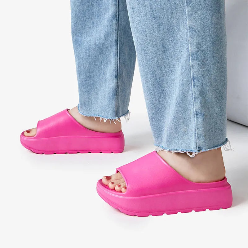 Women's beige fish mouth design beach slippers with a thick 5.5cm EVA sole.
