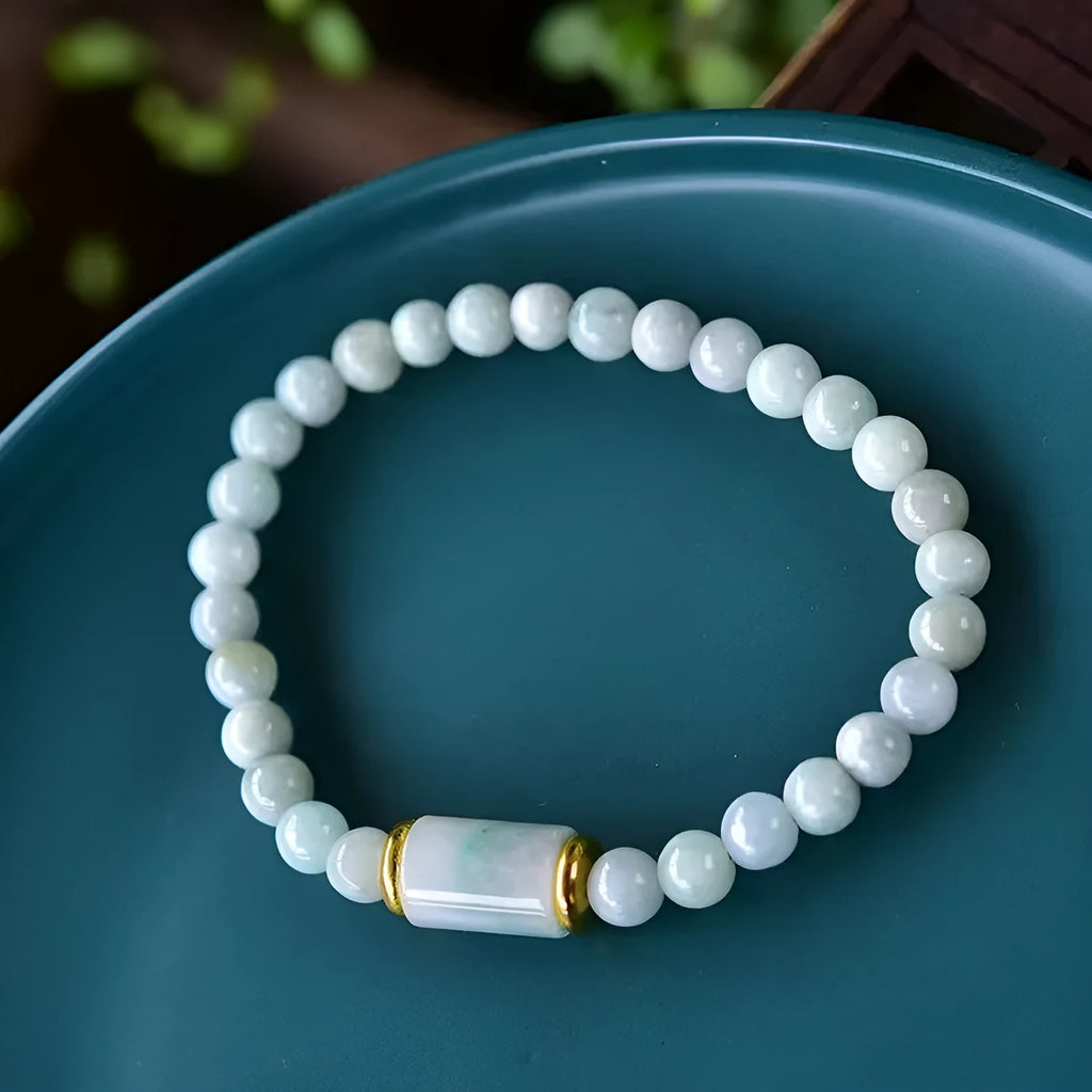 Natural Myanmar jade round beads bracelet in emerald green with ethnic geometric design