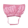 Silver adjustable pet shower cap for dogs and cats on a non-woven fabric background.