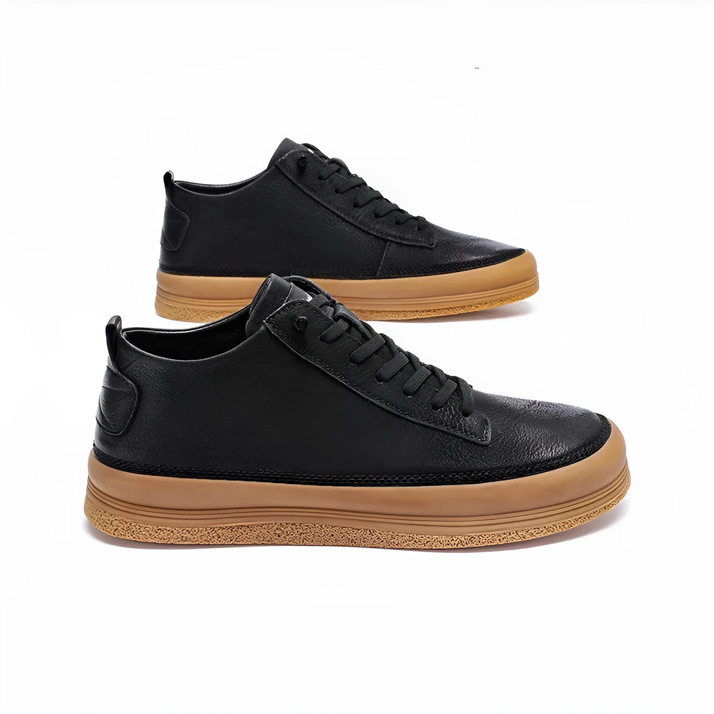 Men's black casual leather shoes with a round toe and lace-up front on a white background.