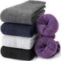 A pair of solid colour wool cashmere blend tube socks with a mid-calf length on a neutral background.