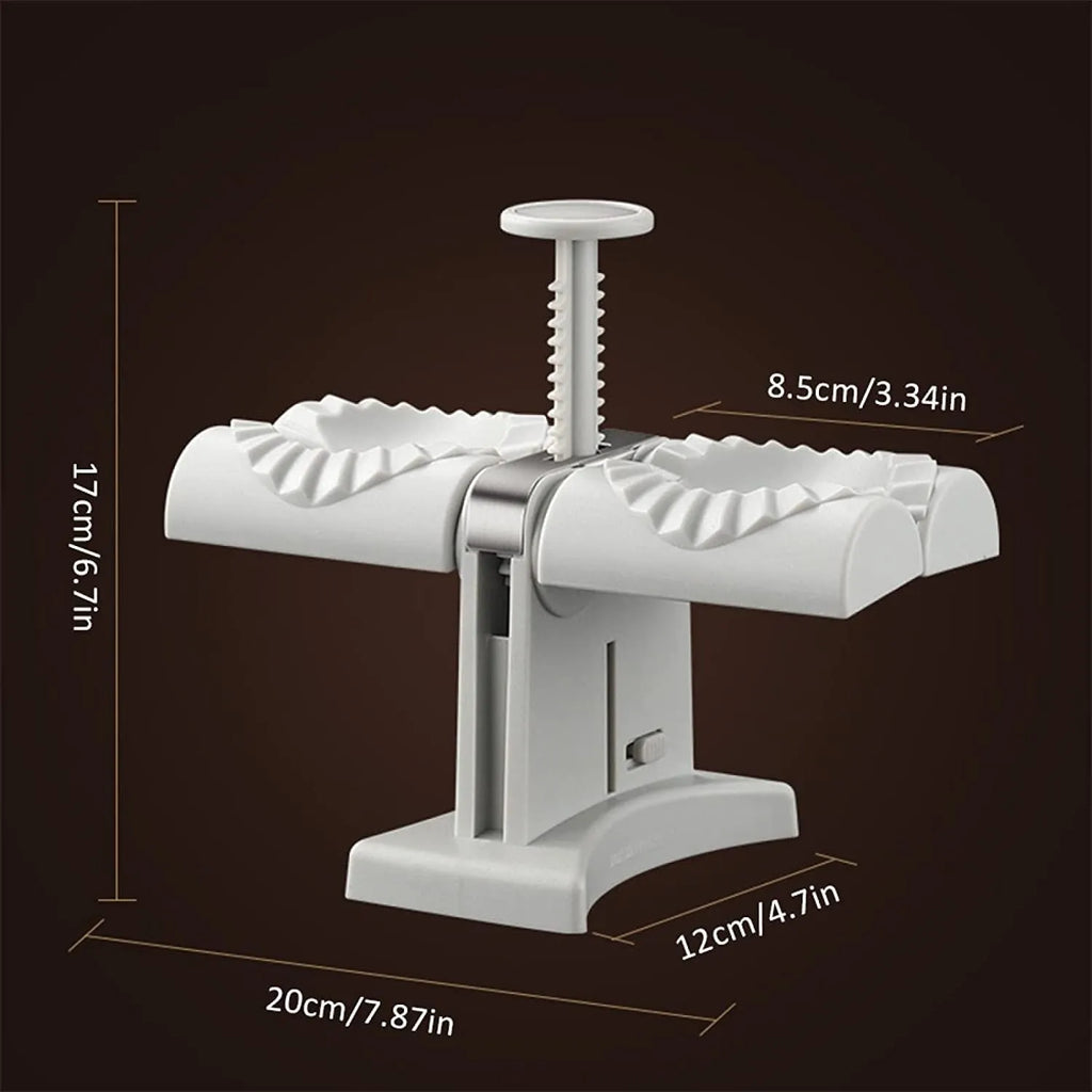 White double-head manual dumpling maker mould made from stainless steel and plastic with an anti-slip base.