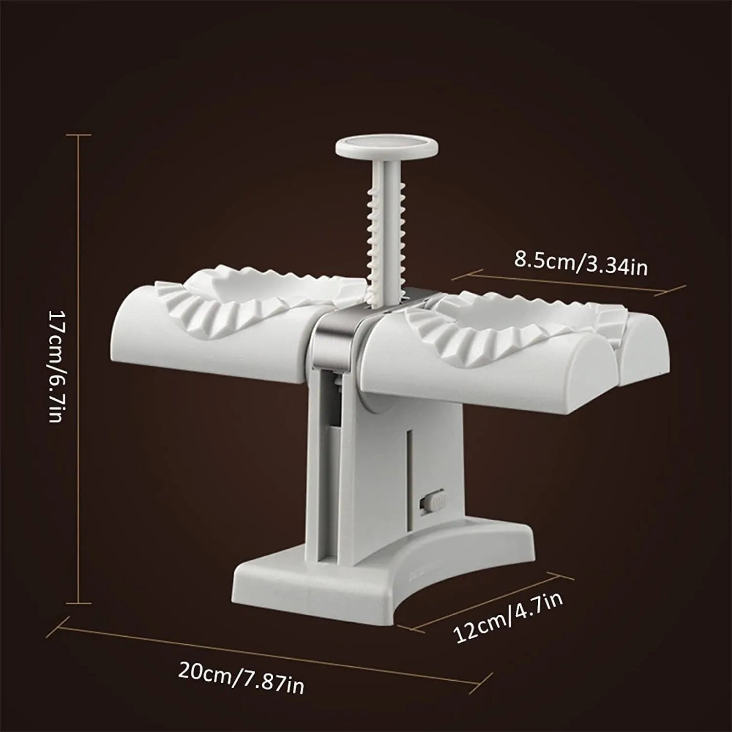 White double-head manual dumpling maker mould made from stainless steel and plastic with an anti-slip base.
