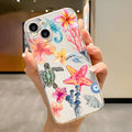 Transparent TPU iPhone case with hand-painted dolphin and turtle design on soft shell