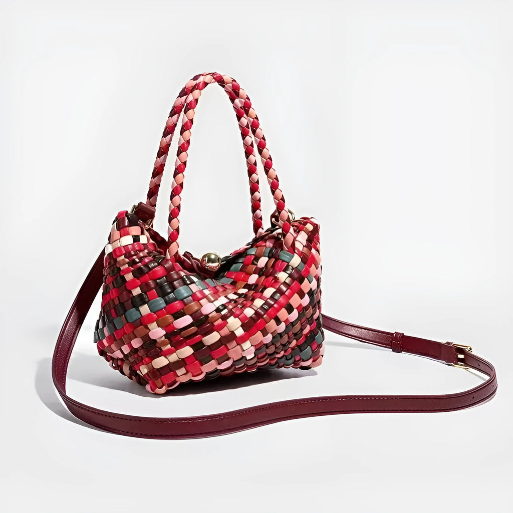 Women's casual woven PU leather shoulder bag showing handmade texture and shoulder strap.