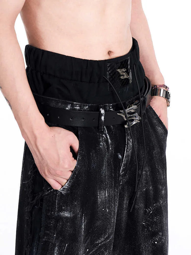 Black men's leather belt with metal letter detail, 110cm long.