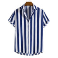 Loose fit polo shirt with printed letters on the front, shown in a blue suit colour variant.