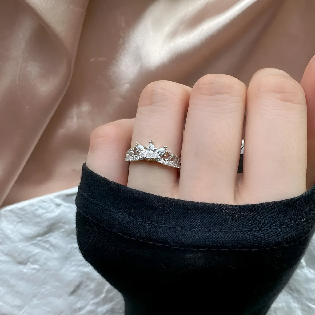 Sterling silver crown-shaped fashion OL women's ring on neutral background