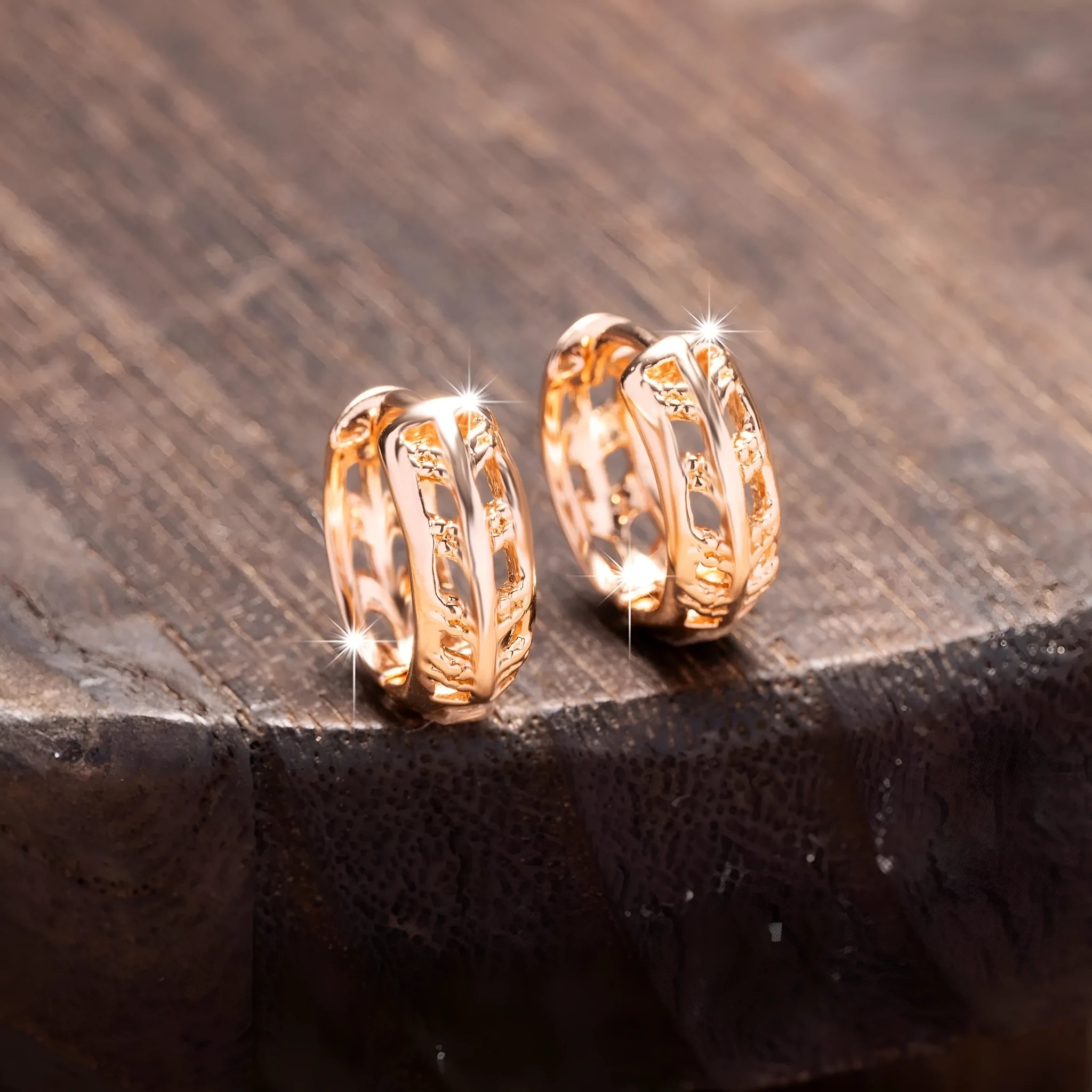 Rose gold copper earrings with hollowed-out leaf design featuring heart shape details