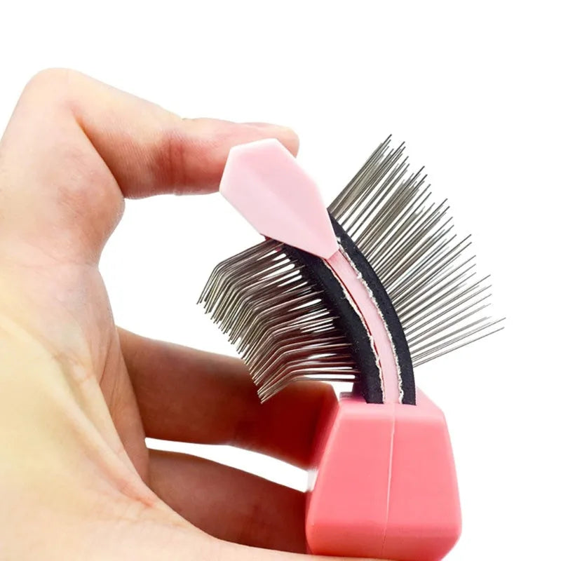 Double-sided blue pet grooming brush with stainless steel pins on one side and soft plastic bristles on the other.