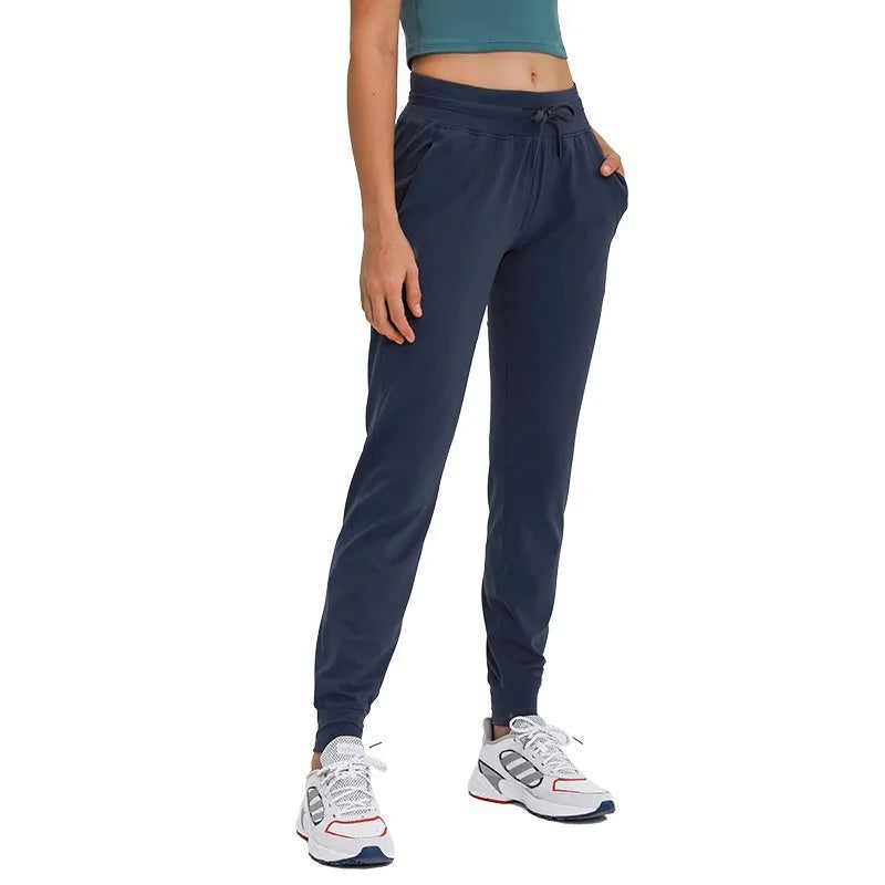 Women's high waist yoga pants with drawstring in quick-drying fabric, multiple colour options