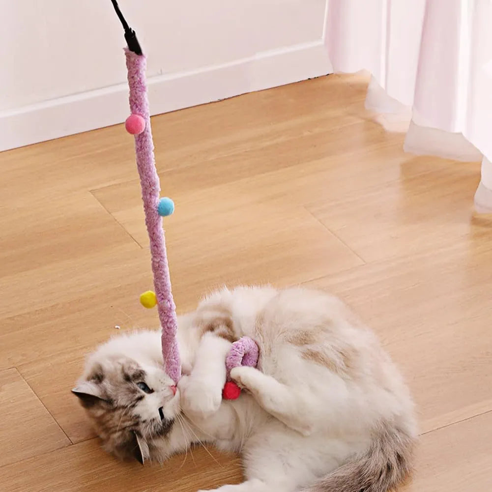 Cat teaser wand with long plush strip and colourful elements for interactive play