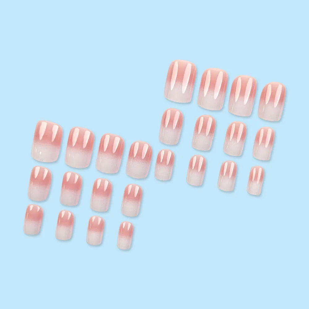Pink and white gradient detachable nail stickers with starry sky pattern on hands showing medium European square shape