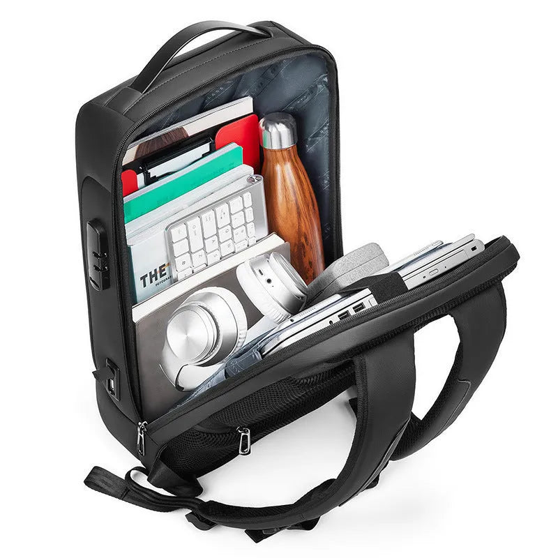 Black Oxford cloth business backpack with air pillow belt straps and organisational compartments