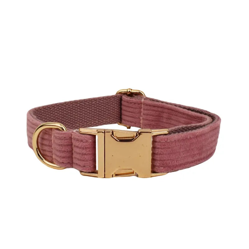 Red corduroy pet collar and matching leash set with optional bow, vest and poop bag accessories