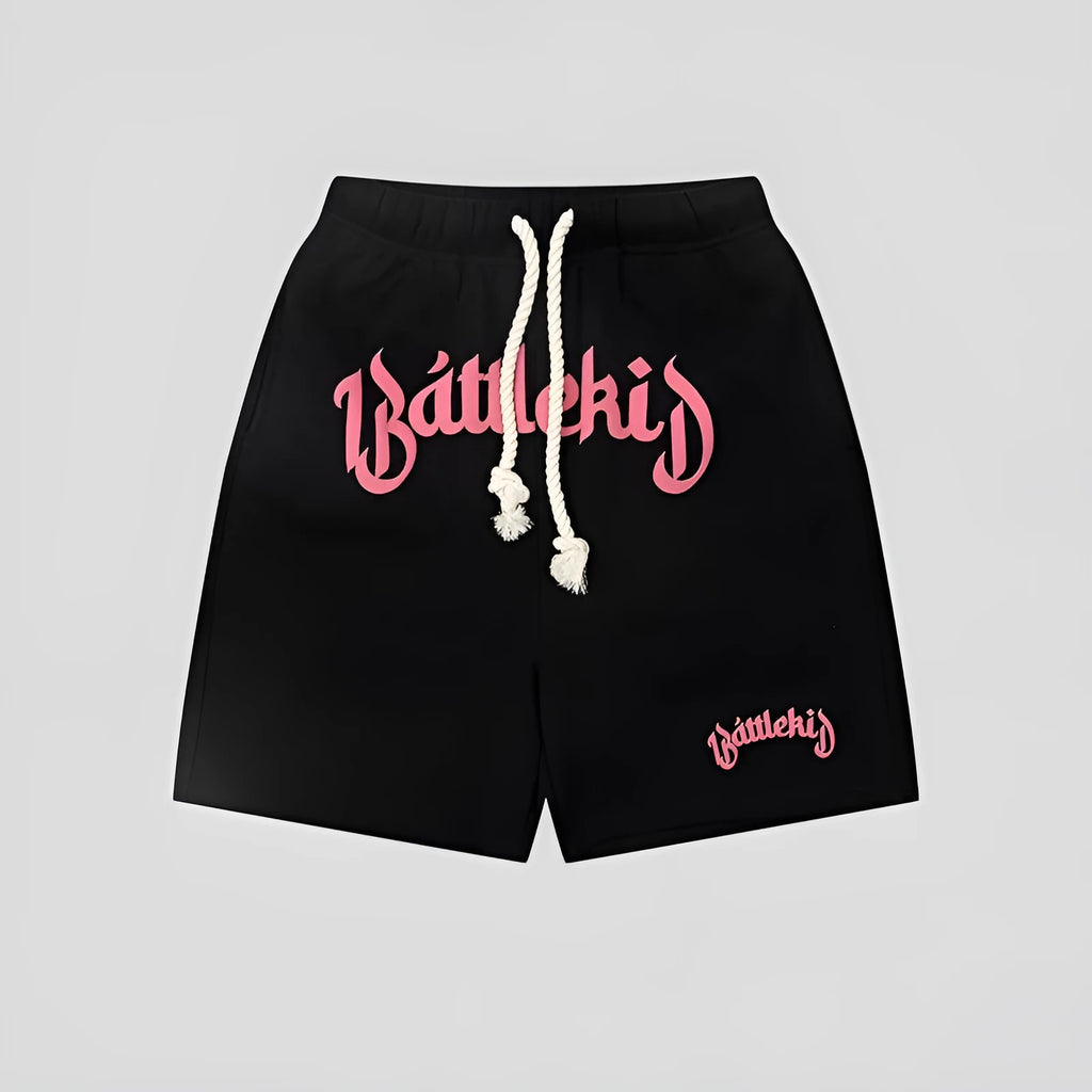 Man's loose-fit cotton-blend shorts in black, shown in a casual streetwear style.