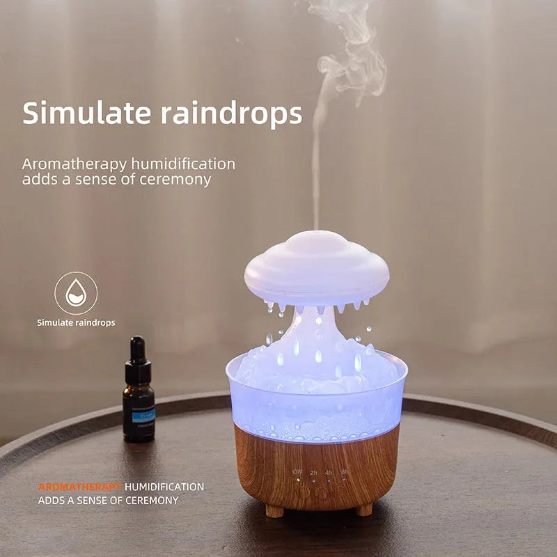 Wood grain finished rain cloud humidifier diffuser with coloured LED night light on table