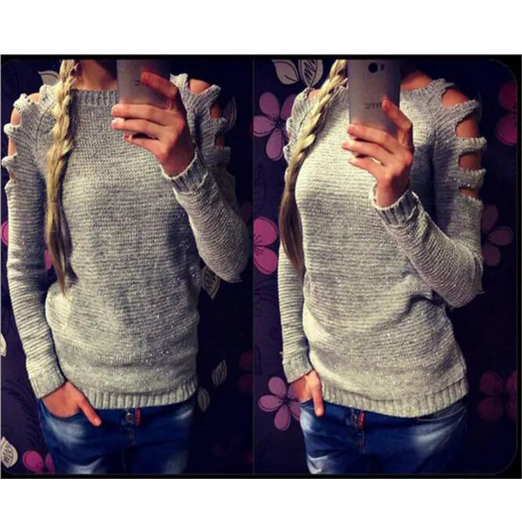 Women's grey crocheted hollow-out long sleeve knit shirt with round neckline on a mannequin