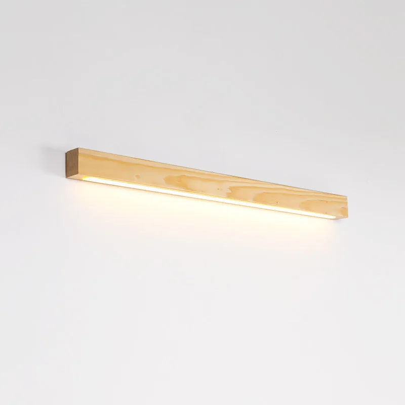 Modern Walnut wood and acrylic log strip wall lamp mounted on a wall in a living room setting.