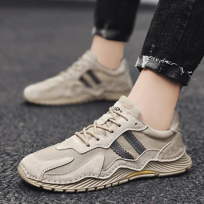 Men's sand-coloured low-top lace-up hiking boots with a pigskin upper and platform rubber sole.