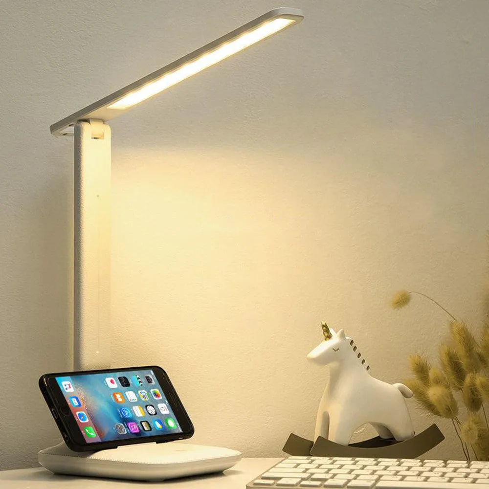 White plastic bedside lamp with touch dimming control and USB charging port