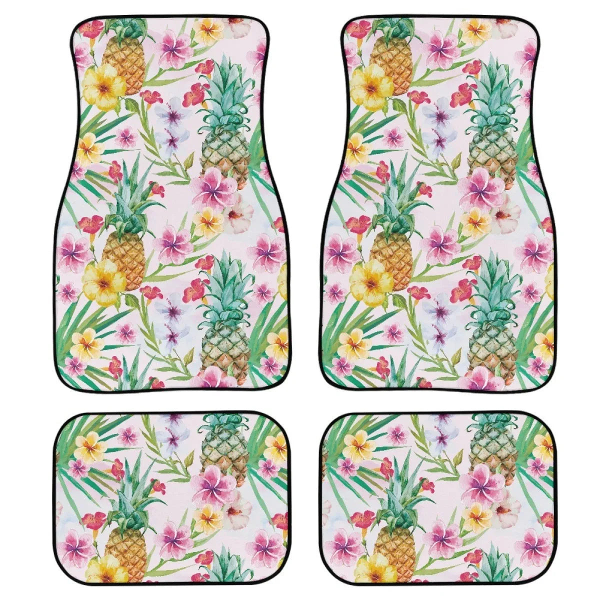 Set of four black printed rubber car floor mats with textured surface, showing thickness.